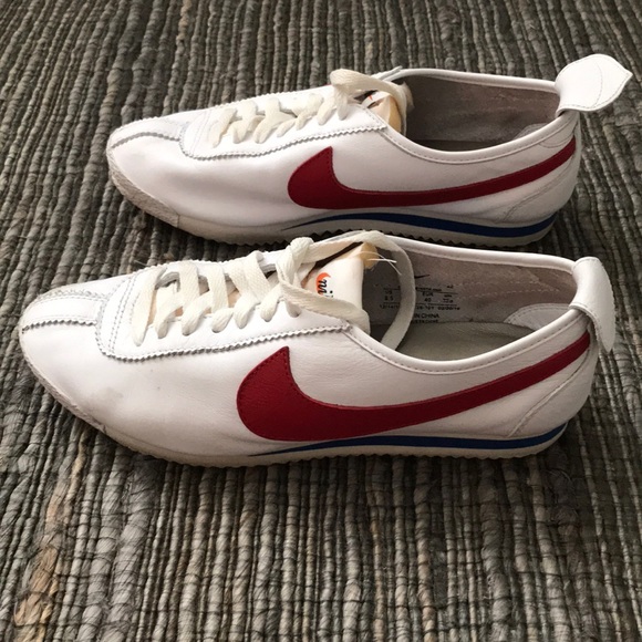 white leather nike with red swoosh